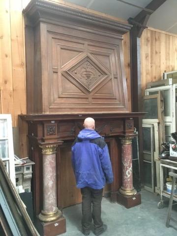 Wooden fireplace, marble columns